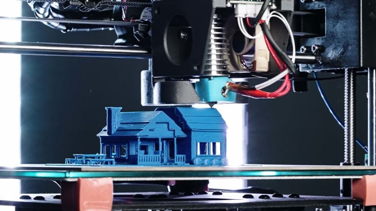 En 3D-printer som printer et hus