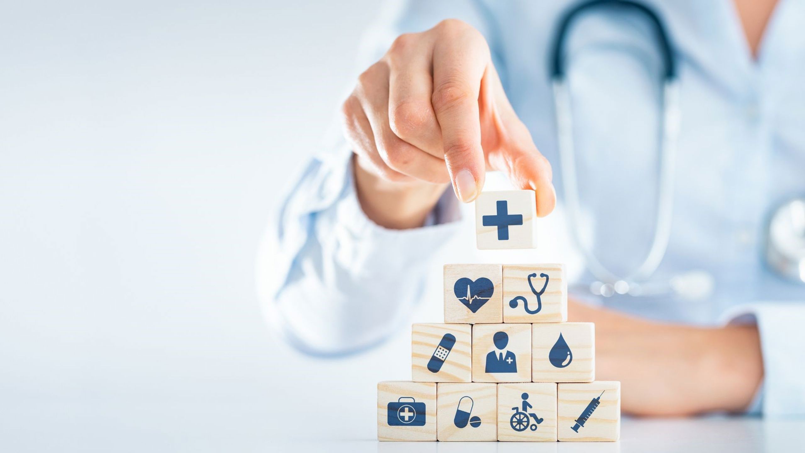 Cubes that illustrates important pieces within interaction and public health